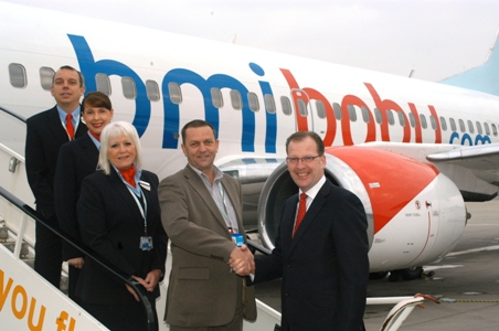 Stansted Airport MD Nick Barton (right) welcomes bmibaby Director Lee Gainsbury (second from the right) and the cabin crew for the inaugural flight to Stansted earlier this week.